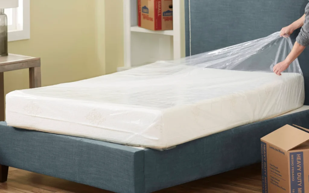 Bed with protective cover